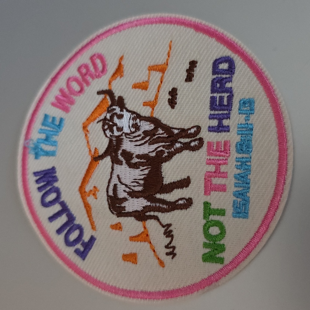 Follow The Word Not The Herd Iron On Patch